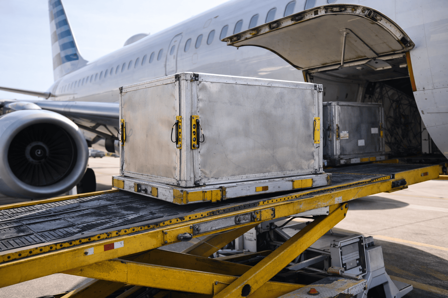 Aviation Cargo being loaded onto an airplace